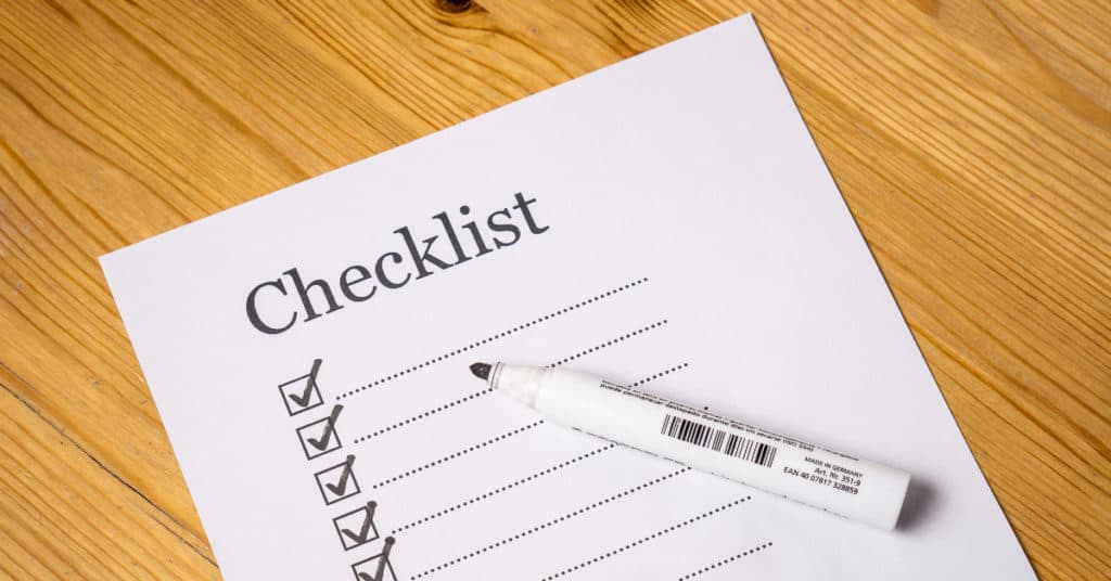 a stock photo of a blank checklist with a marker laying on top